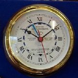 Brass Cased Tide Clock on Hardwood Mount