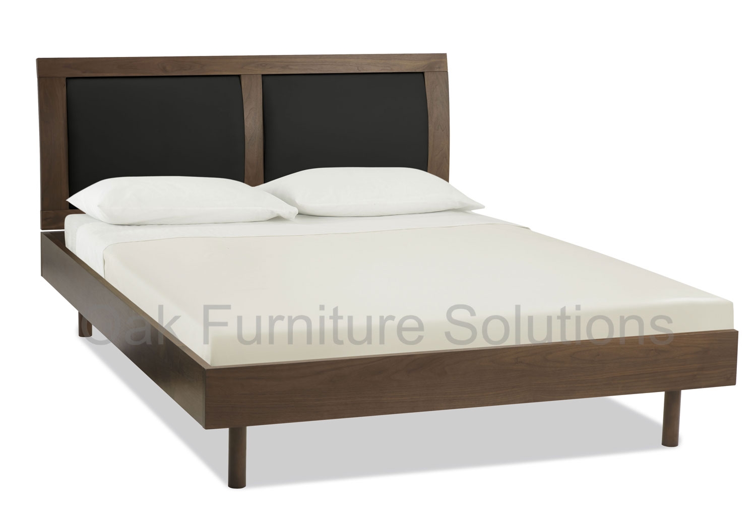 Walnut Bedstead with black leather panels -
