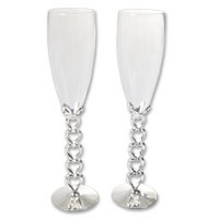 Champagne glasses with heart and bow stem