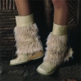 chicana faux fur trim boots with pom poms