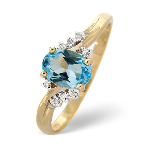0.94 Ct Blue Topaz and 0.03 Ct Diamond Twist Ring In 9 Carat Yellow Gold