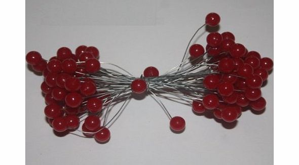50 wired stems of artificial holly berries 100 plastic berries in total