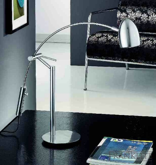 Brushed chrome finish desk lamp with integral dimmer switch.