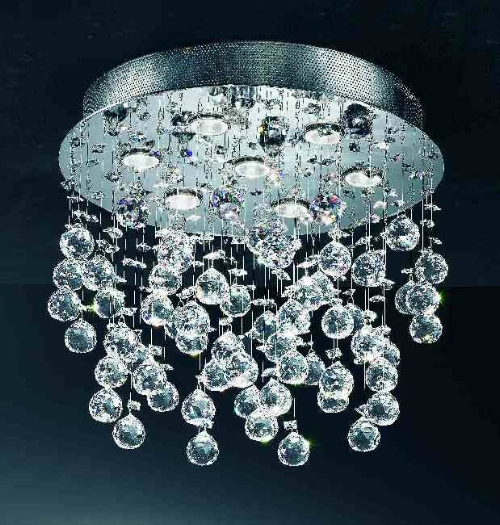 Modern flush fitting chandelier comprising faceted lead crystal spheres on chrome finish metalwork