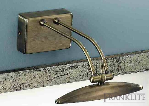 Satin bronze finish low voltage picture light with integral transformer.