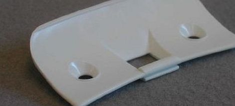 Hotpoint Door Latch Plate: Hotpoint 1603063 to C00201014 Hotpoint TL Series tumble dryer WM Series washing machine, WD Series washer dryer door latch cover