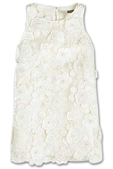 Ivory broderie Anglaise sleeveless swing blouse with applique flower detail.