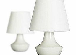 Two cream bedside lamps