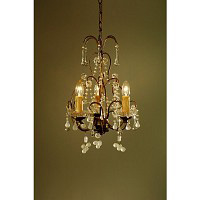 This is a simple yet stunning chandelier with clear and white crystal trimmings and droplets. This l