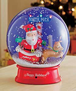 Let it snow all the time.30cm animated light-up snow globe featuring cheery Santa, snowman and tree