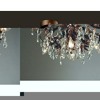 This bronze ceiling chandelier has a intricate floral design with clear crystal droplets.Bulb type -