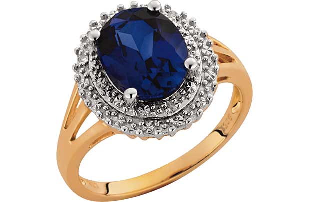 Show that special someone how you feel with this 18ct gold plated silver ring. This ring features a sapphire at its centre with diamonds surrounding it. Round brilliant cut diamond. Clarity of diamond I3. Diamond colour I. Guaranteed diamond weight 0