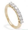 18k gold eternity ring, claw-set with diamonds weighing 0.77 carats