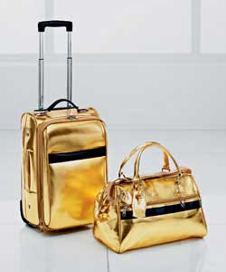 Set includes 1 trolley case and 1 gladstone bag.Metallic gold.PVC.Trolley case.Interlocking zips.loc