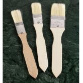 Traditional natural bristle brushes which hold more liquid and coat more evenly than synthetic alter