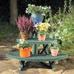 Attractive 3 tier corner plant stand made from green durable plastic.Size 83D x 54W x 54H. Easy