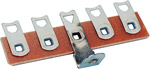 Five tags mounted on a paxolin strip where the middle tag is for screw fixing.
