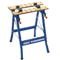 Portable workbench with dual clamping action and 24 holes for work clamping dogs. Folds flat for