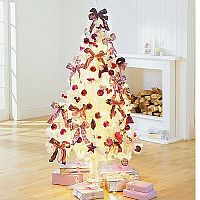 180cms. white tree with 60 purple and cerise decorations, 60 lights and velvet top bow to complete