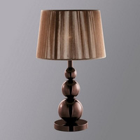 An elegant contemporary metal table lamp in a chocolate metallic finish complete with matching strin