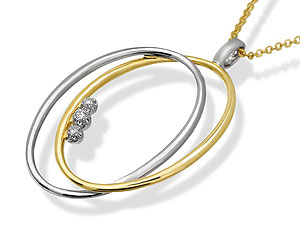 `Two ovals, one white and the other yellow gold create an interesting three dimensional design, with