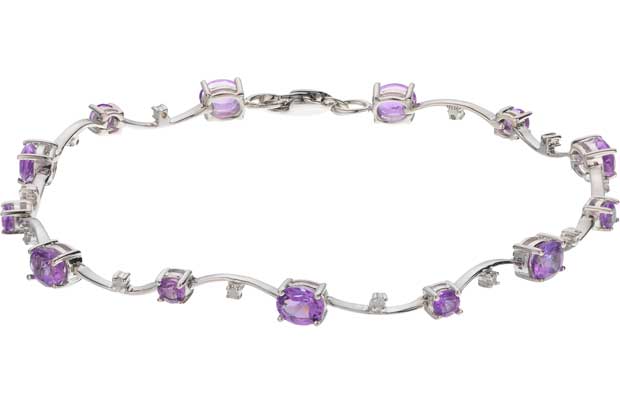 This stunning 9ct white gold bracelet designed with 10 delicately placed diamonds and precious amethyst stones makes a gorgeous gift for someone special. The simple