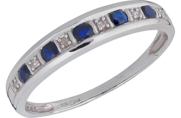 This 9ct White Gold Blue Sapphire and Diamond Half Eternity Ring is the perfect was to show a loved one just how much they mean to you. A beautiful White gold band incrusted with Sapphire and Diamond stones which sparkle and shine to make this a very