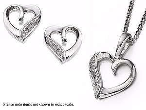 Diamond accents dot one edge of these 7mm open heart earrings and matching 10 x 10mm heart pendant, strung from an 18/46.5cm white gold chain, with the other edge an attractive polished finish, .