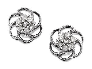 Loops of 9ct white gold for the petals with a cluster of seven diamonds at the centre (10pts total diamond weight per pair) together create these pretty 7mm flower earrings that look so much more expensive than they are.