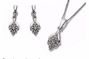 A very flattering gift set consisting of a diamond shaped pendant that hangs beautifully around the neck on an 18 white gold chain, plus 15mm long matching stud earrings (10pts per pair). Total diamond weight for gift set - 20pts.