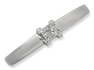 `The wide, bevelled edged band and shoulders of this 9ct white gold ring is the ideal setting for th