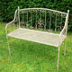 Take time to enjoy the garden sitting on this wonderfully crafted wrought iron bench.