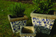 This is the Aged Ceramic set of three planters in different sizes of part-glazed stoneware, all with