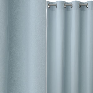 Ready-made curtains in a light, blue/grey colour.
