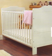 andrew cot bed made from solid beech wood, changes into a bed when your child needs it. features a