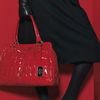 Exclusively available from APART: beautiful bag made from quilted patent leather. Elegant tag with A