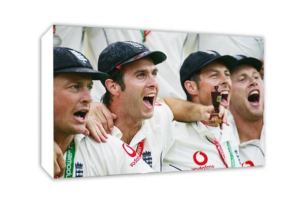 2005 Michael Vaughan captain of England celebrates with a replica Ashes Urn as he joins team mates i