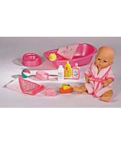 Drink and wet baby doll comes complete with her very own bath, potty and bathing accessoriesBathe he