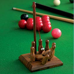 Hilarious fun for small spaces indoors and out! Simply swing the ball and topple the balls! Great