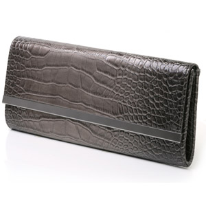 Mock croc patent clutch with metal bar detail on fold over flap and a magnetic fastening. The Bdarcy