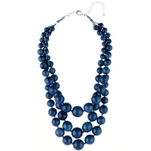 Team this chunky blue beaded necklace with a cool and comfortable outfit for laidback summer style
