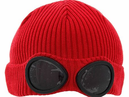 C. P Company Goggle Beanie Hat features ribbed fabric with goggle inserts and is made of wool great for keeping you warm in the winter weather and cold breeze team with a goggle jacket and gloves to complete the look. Colour: Red Fabric: 100% Wool Ca
