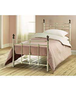 Ivory colour bedstead with antique brass colour finials.Metal frame.Firm mattress.Overall size