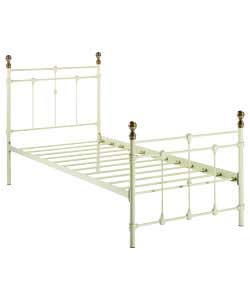 Ivory colour bedstead with antique brass colour finials.Metal frame.Overall size (H)113.5, (W)96,