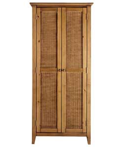 Pine frame and door fronts with pine veneer sides and top. Antique pine finish and rattan