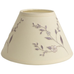 A delightful cream drum lampshade with a pink and blue floral design