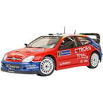A detailed diecast replica of the Citroen Xsara WRC that was driven to championship glory by