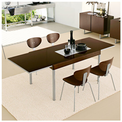 The Clara extending glass dining table is a beautifully crafted piece of frosted glass upon a choice