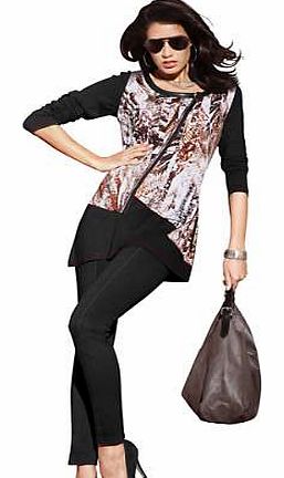 Fitted long sleeve top with a popular patchwork effect that gives this top its unique style! Faux leather contrasting piping adorns the large, rounded neckline. With asymmetric decorative zip fastening, decorative stitching on the front and a flatter