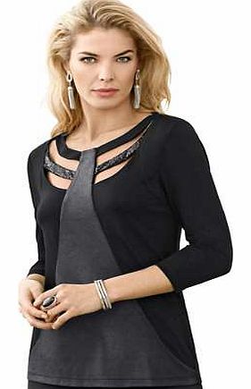 This irresistible top features a textured jersey insert, creating a faux leather look to provide that special something! Decorated with sequins and boasting an irresistibly deep, yet modest, neckline. Complete with three-quarter length sleeves. Creat